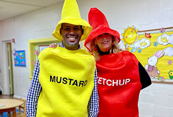 Staff dressed as ketchup and mustard